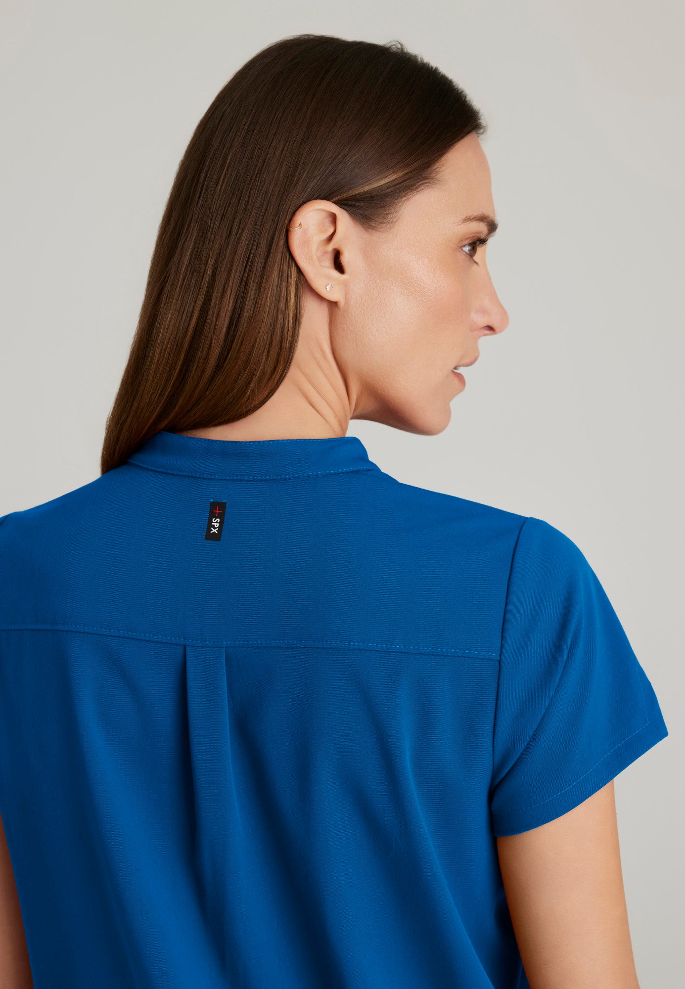 GRST230 Women's Avery 2-Pocket Top Royal w/ University Orthopedics Logo