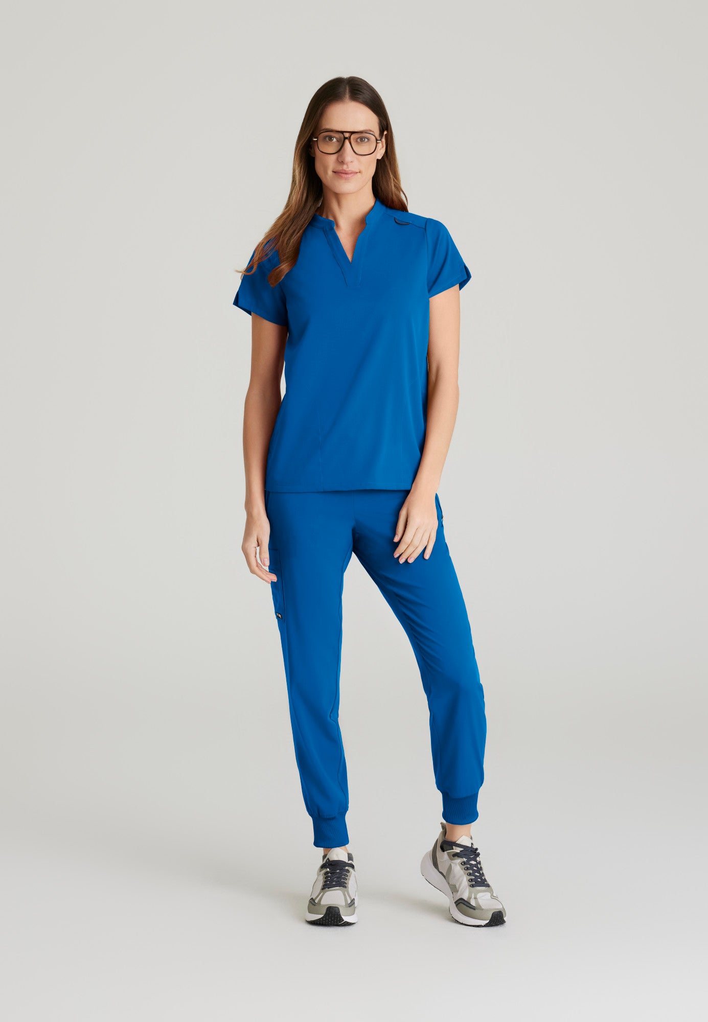 GRST230 Women's Avery 2-Pocket Top Royal w/ University Orthopedics Logo
