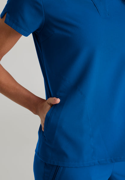 GRST230 Women's Avery 2-Pocket Top Royal w/ University Orthopedics Logo